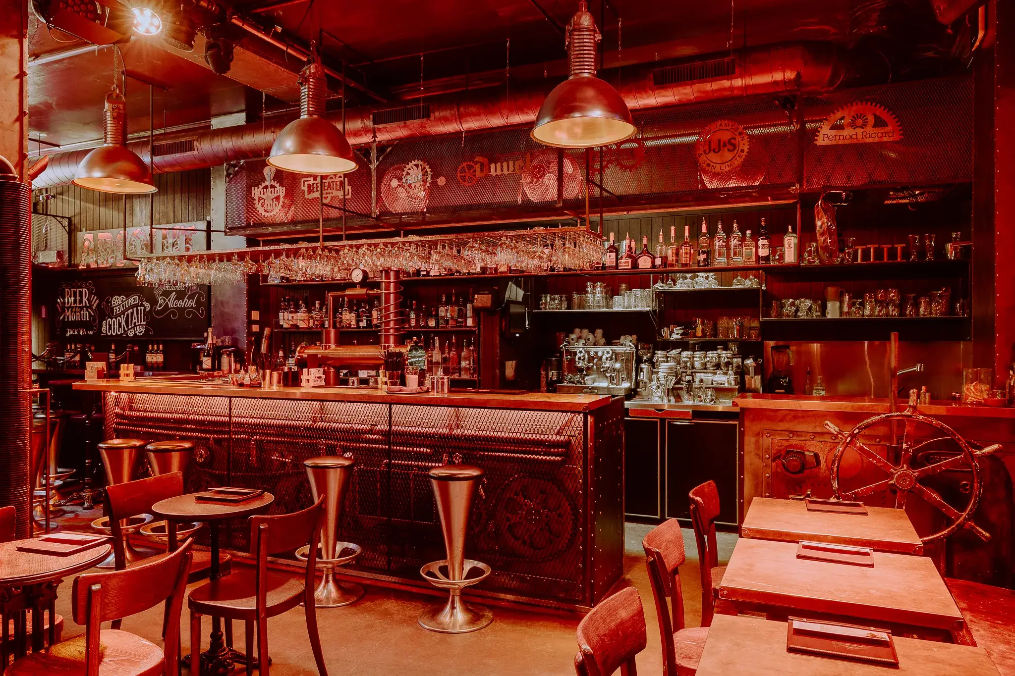 The main ground-floor bar, its bottles and its stools